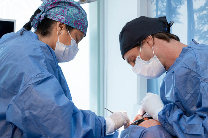 The patient is undergoing a full mouth implant surgery in Cancun